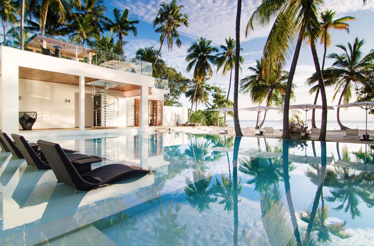Poolside view of the Amilla Estate - The Mansion in the Maldives