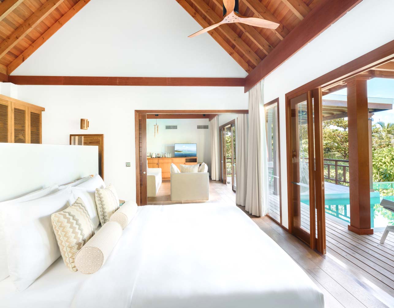 The bedroom with 1 king bed inside of our Maldives Luxury Villas.