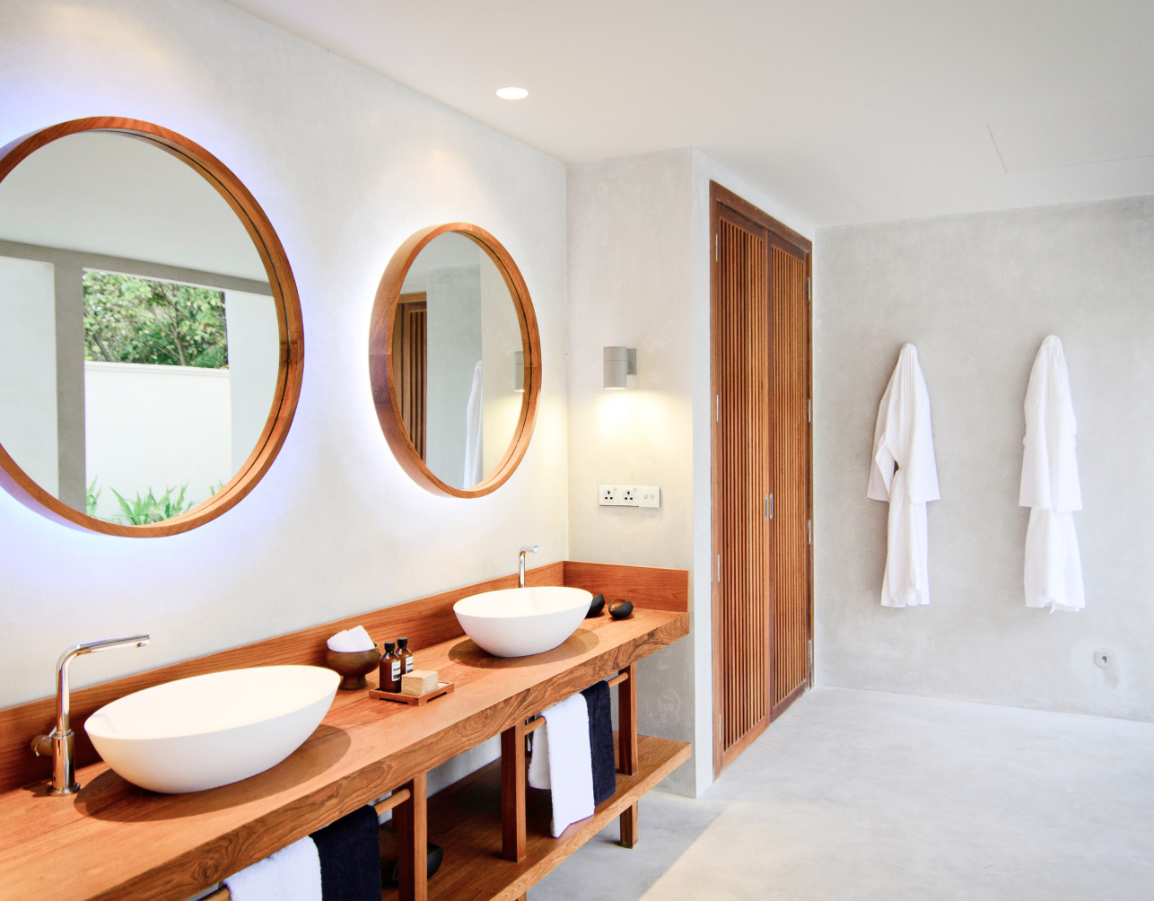 The full bathroom with double sinks inside our Maldives Beach Villa