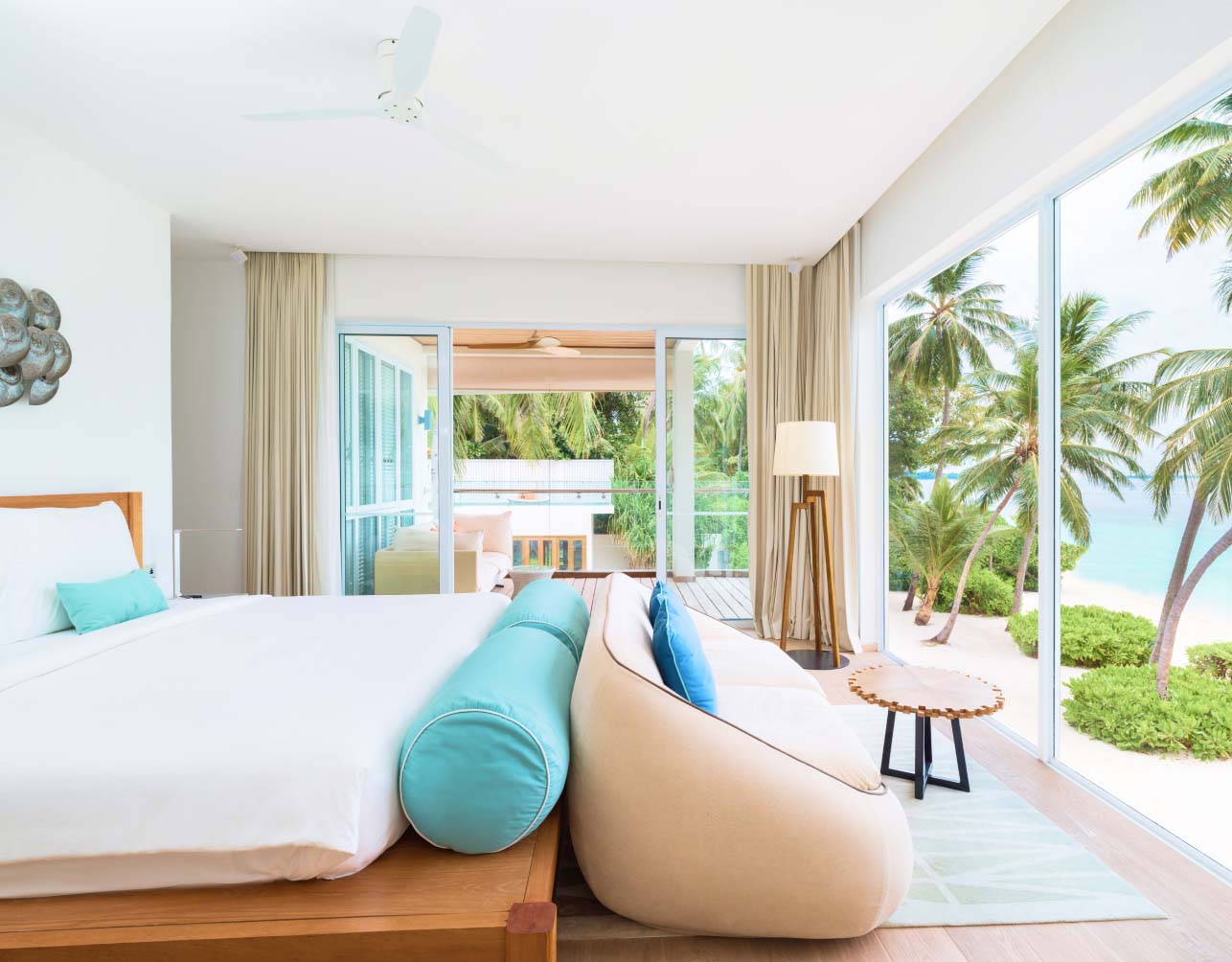 The oceanview master suite with private lounging balcony and ensuite bathroom in our Luxury Maldives Family Accommodations.