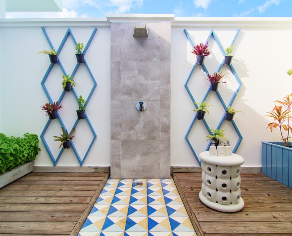 The outdoor garden shower at our Sunset Water Villas with private pool.