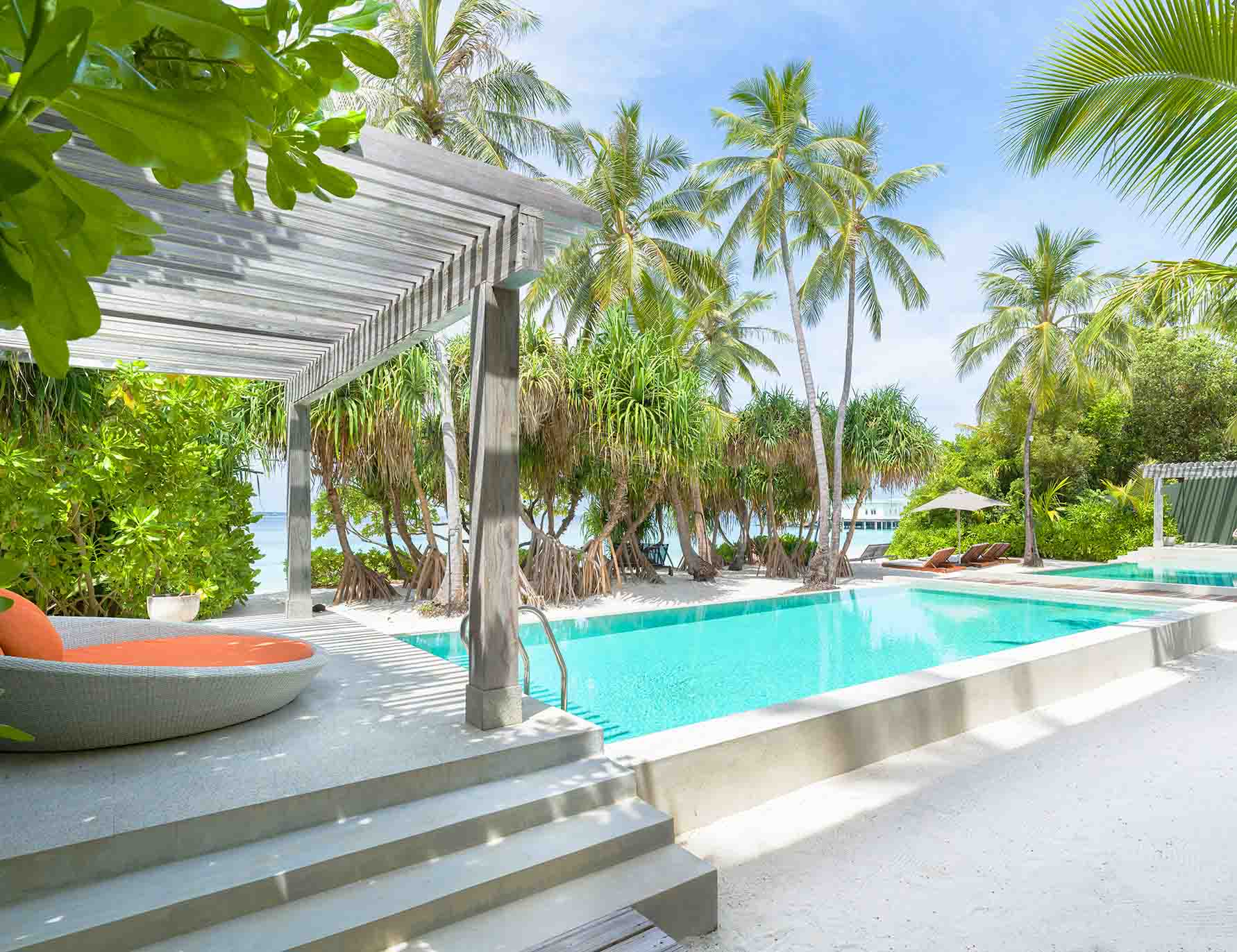 The days beds and 2 private freshwater pools with private beach access at our Great Beach Residence Maldives.