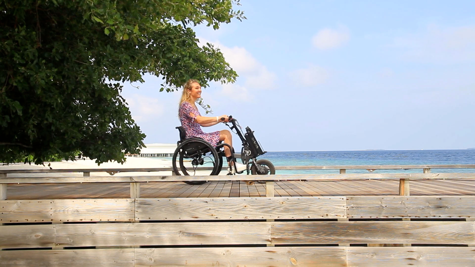 Sophie Morgan visiting Amilla Fushi, a wheelchair accessible beach resort in the Maldives dedicated to inclusive hospitality.