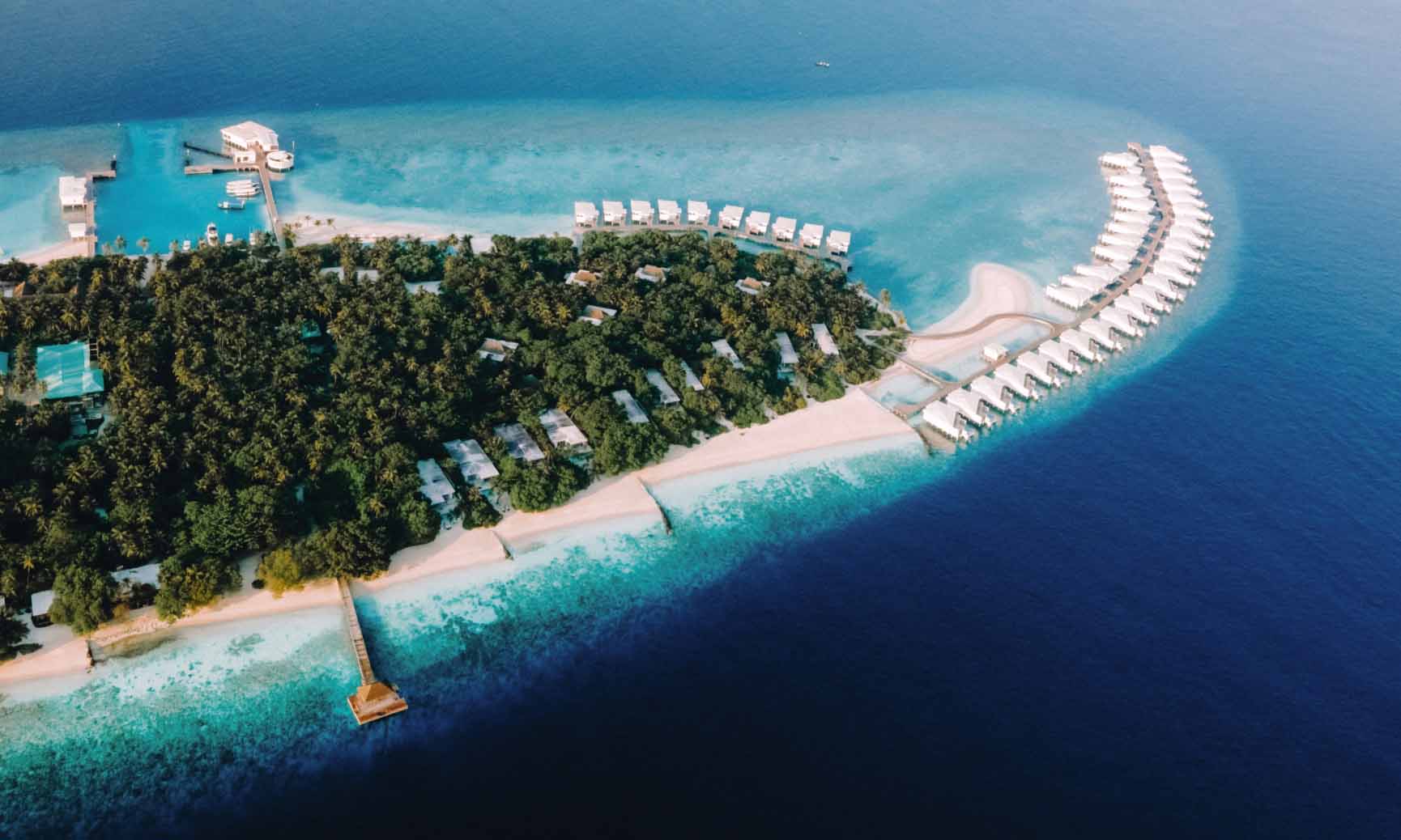 Overhead view of our Luxury Villas in the Maldives situated over the ocean.